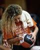 Former Texas Longhorns libero Zoe Jarvis signs an autograph as the Longhorns take on the Tennessee Lady Volunteers at home in Austin, Oct. 8, 2025.