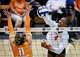 Texas Longhorns outside hitter Torrey Stafford (4) hits the ball over Tennessee defense in the third set as the Longhorns take on the Tennessee Lady Volunteers at home in Austin, Oct. 8, 2025.