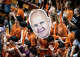 Fans hold a cutout of Texas Longhorns Head Coach Jerritt Elliott as the Longhorns take on the Tennessee Lady Volunteers at home in Austin, Oct. 8, 2025.