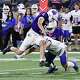 Midland High quarterback Tristan Love tackled in the open field by a Frenship High defender, Oct. 10, 2025, at Astound Broadband Stadium. 