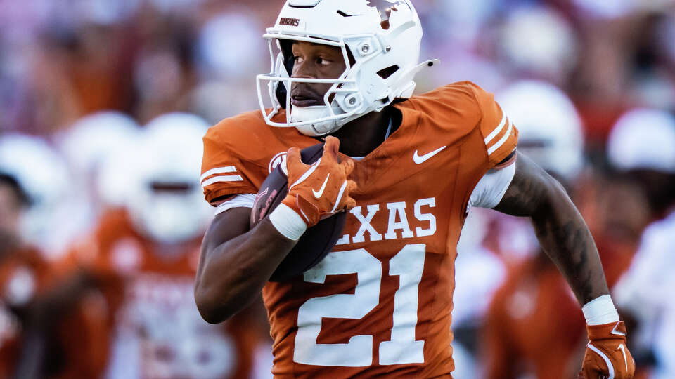Texas Longhorns wide receiver Ryan Niblett (21) returns the ball off a punt for a touchdown in the fourth quarter of the Red River Rivalry, as the Sooners play the Longhorns at the Cotton Bowl in Dallas, Oct. 11, 2025.