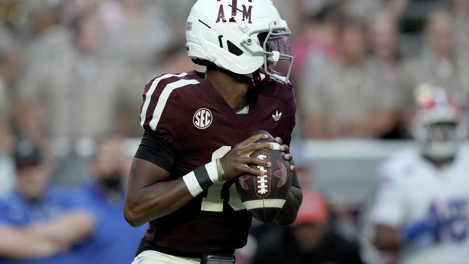 Texas A&M quarterback Marcel Reed (10) looks to pass downfield against Florida during the first quarter of an NCAA college football game Saturday, Oct. 11, 2025, in College Station, Texas. (AP Photo/Sam Craft)