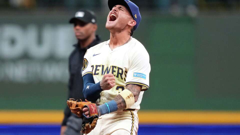 Milwaukee Brewers shortstop Joey Ortiz (3) reacts to the team's win over the Chicago Cubs in Game 5 of baseball's National League Division Series, Saturday, Oct. 11, 2025, in Milwaukee.