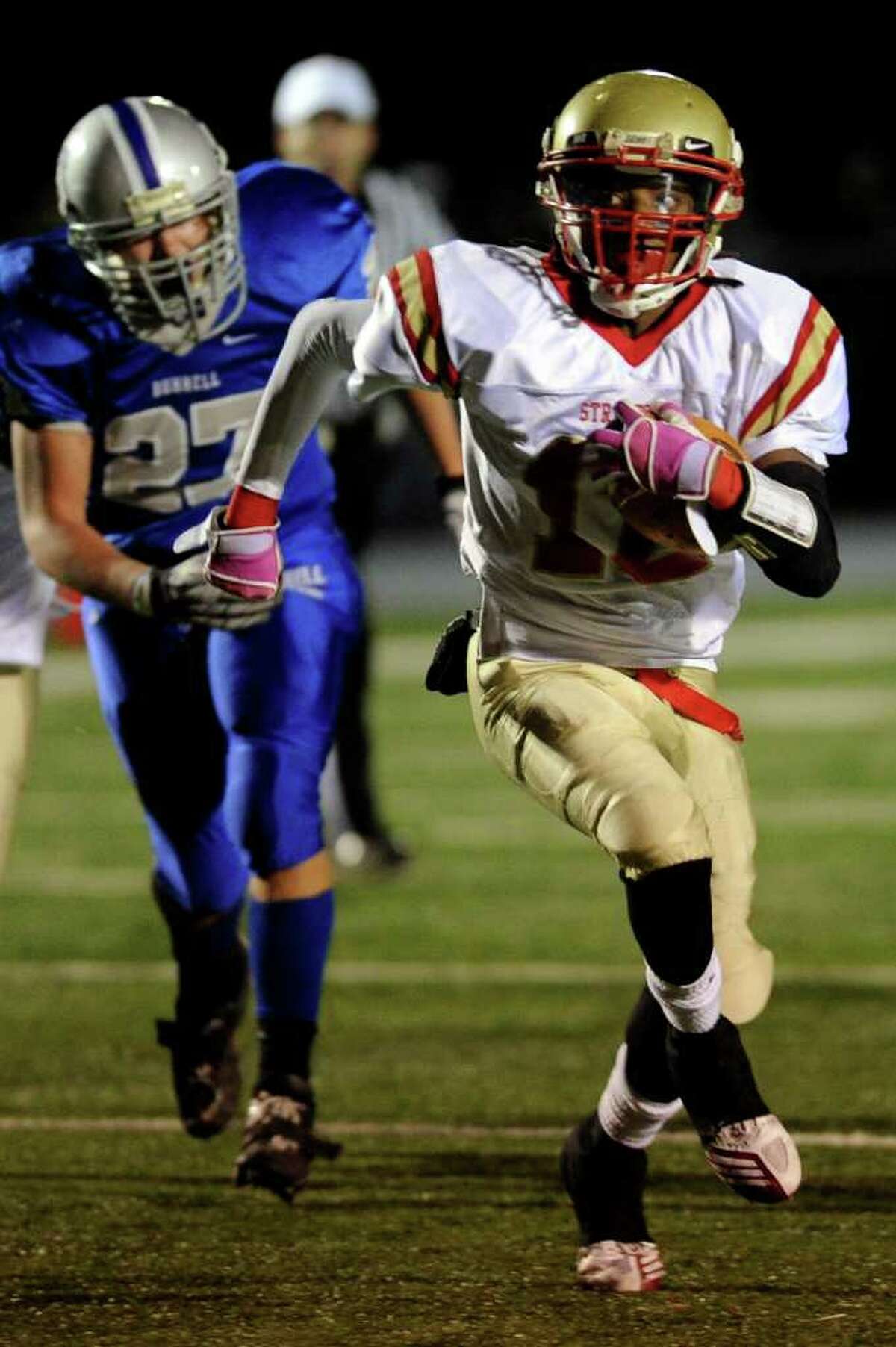 Stratford's Markey Desruisseaux carries the ball to a touchdown during Wednesday's game at Bunnell High School on November 24, 2010.