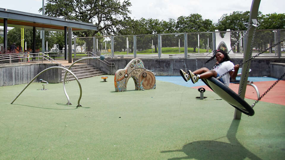 Faye Reese, 7, enjoys a swing at Emancipation Park in Houston on Monday, May 31, 2021.