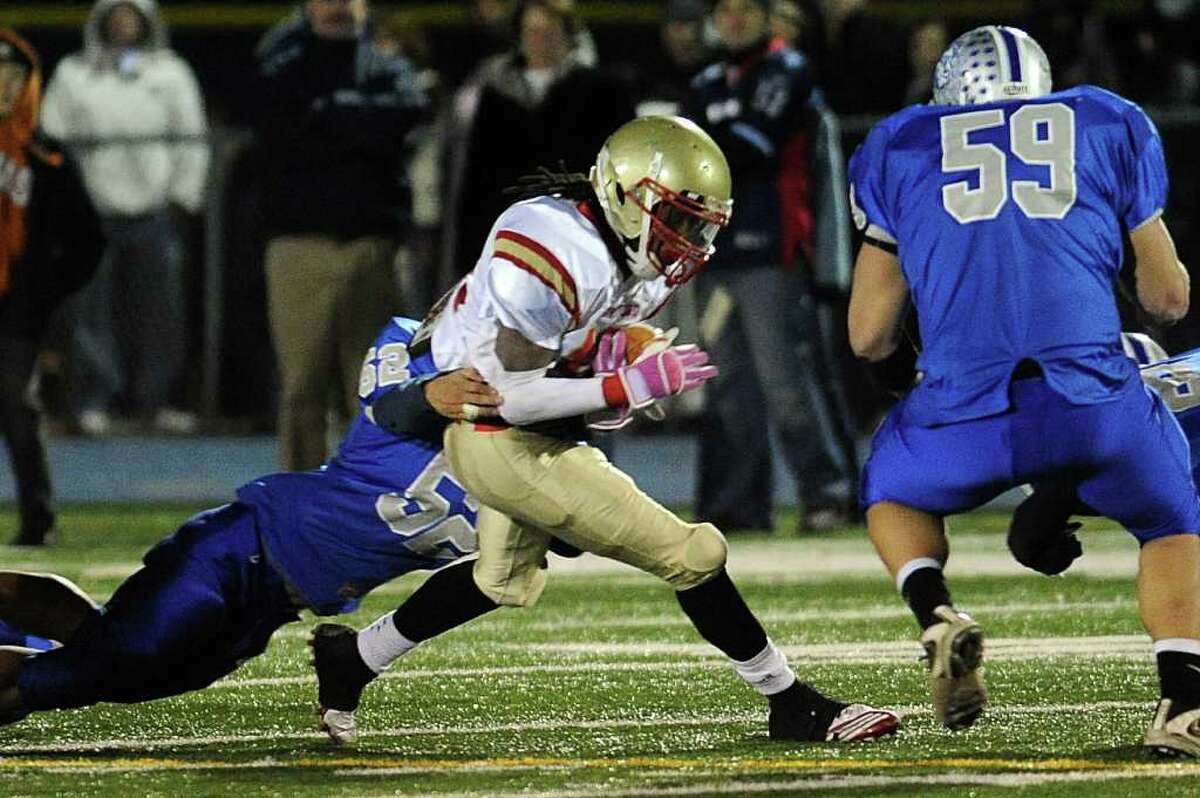 Stratford's Markey Desruisseaux carries the ball during Wednesday's game at Bunnell High School on November 24, 2010.