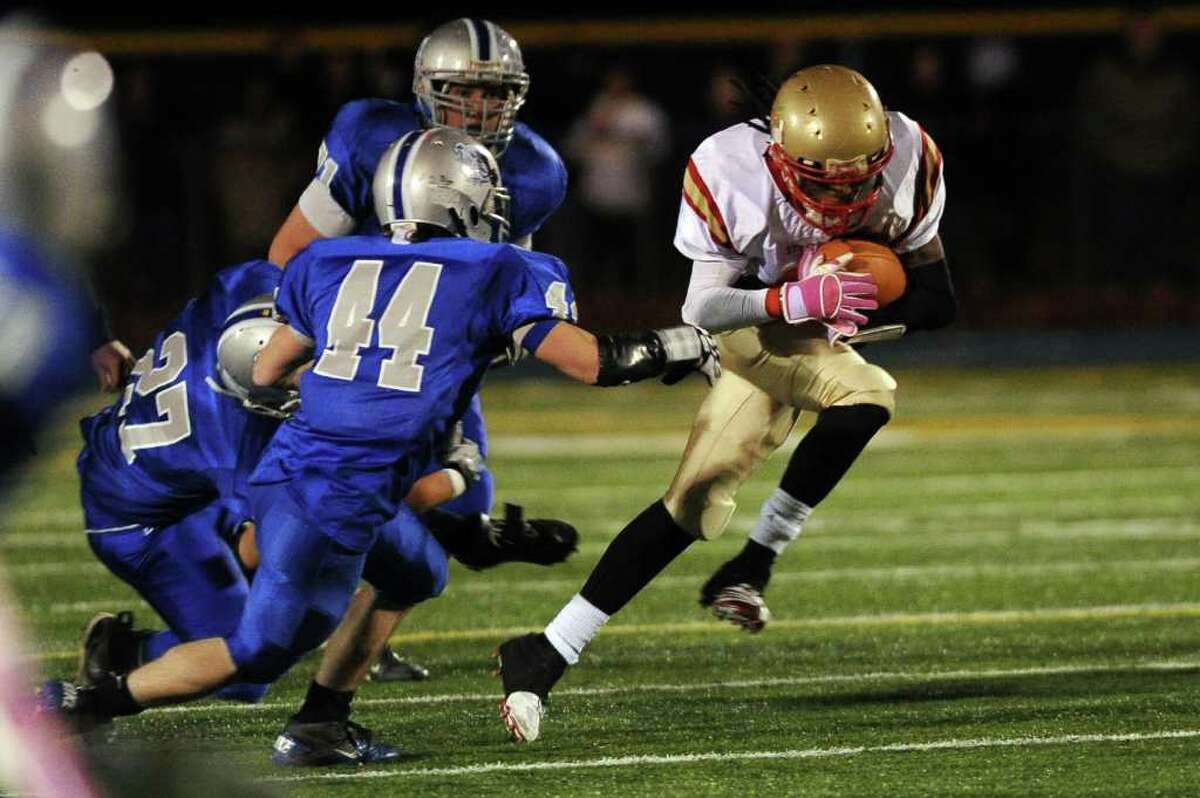 Stratford's Markey Desruisseaux carries the ball during Wednesday's game at Bunnell High School on November 24, 2010.