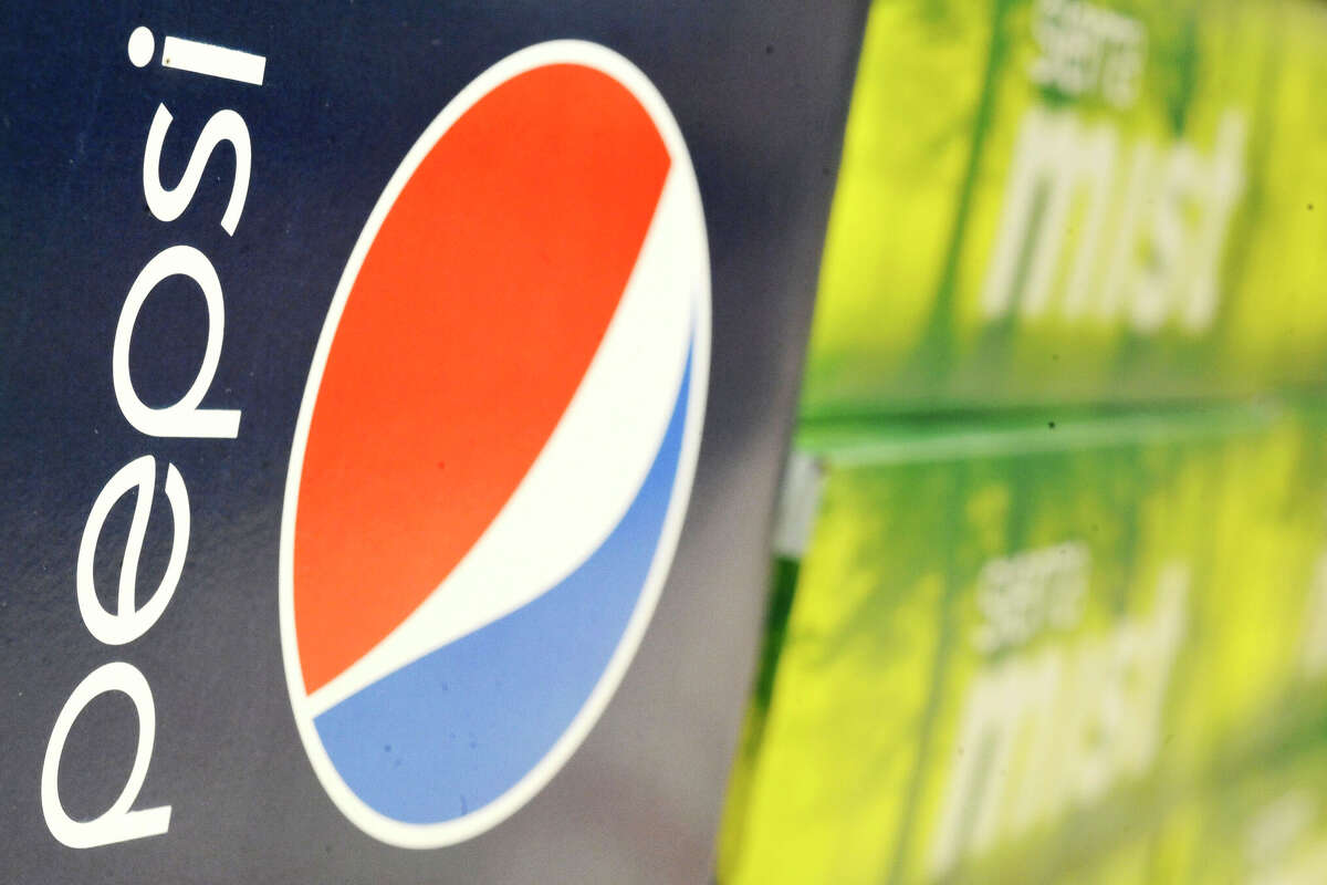Pepsi products are seen on the shelf at a grocery store, Friday, Feb. 13, 2009, in Danvers, Mass. PepsiCo Inc. said Friday its fourth-quarter profit fell partly on restructuring and impairment charges, but adjusted results met analysts' expectations.