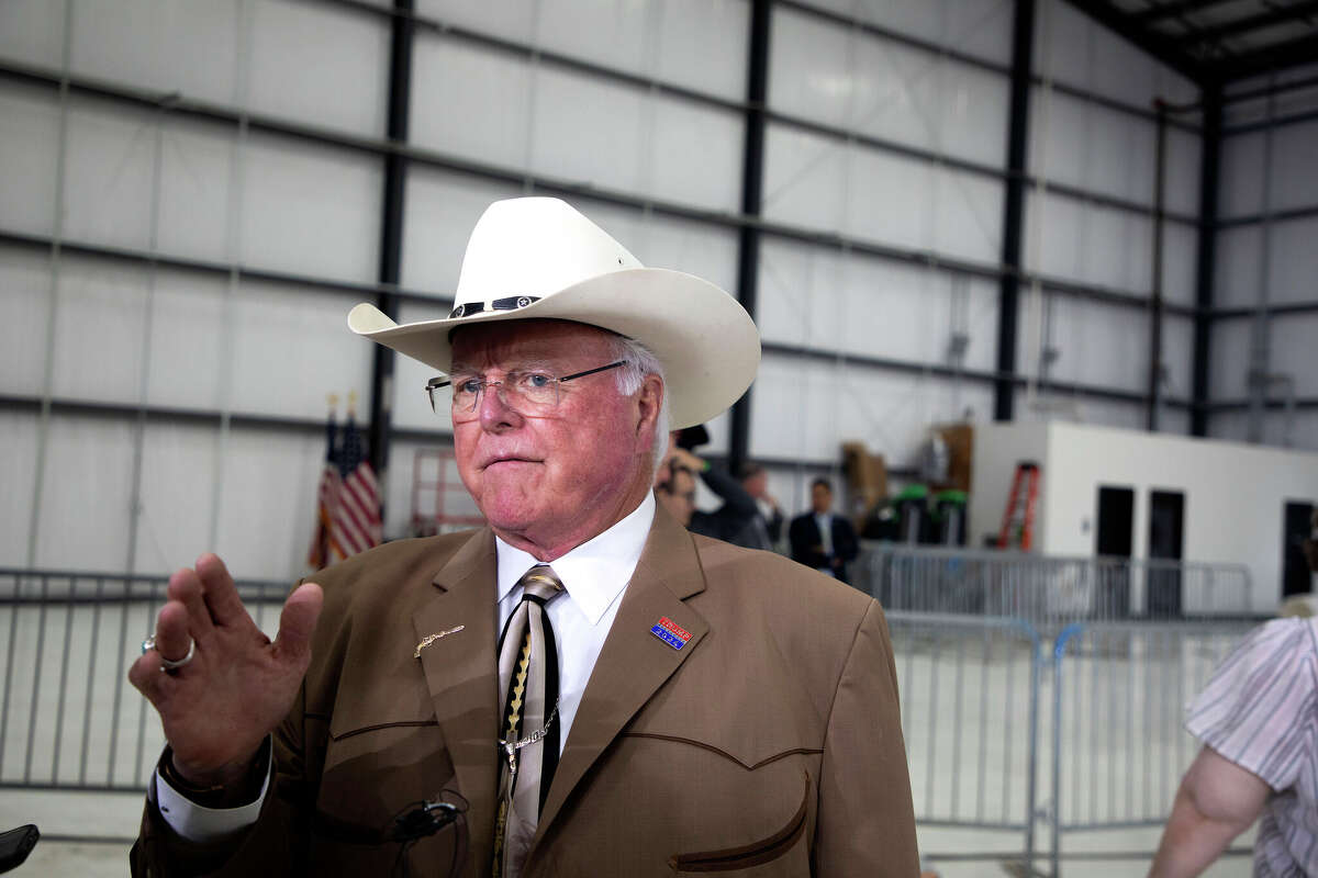 Commissioner of Agriculture Sid Miller speaks to the media during a Trump rally at Million Air in Austin, Texas, on Oct. 25, 2024