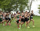 Varsity boys are off at the start of the SCC high school cross country championships at East Shore Park in New Haven, Conn., Wednesday, October 15, 2025.