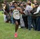 Hamden's Alexander Medina nears the finish line in second place in the 5,000 meters during the SCC high school cross country championships at East Shore Park in New Haven, Conn., Wednesday, October 15, 2025.