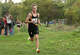 Amity's Luke Cushing holds the lead in the 5,000 meters during the SCC high school cross country championships at East Shore Park in New Haven, Conn., Wednesday, October 15, 2025.