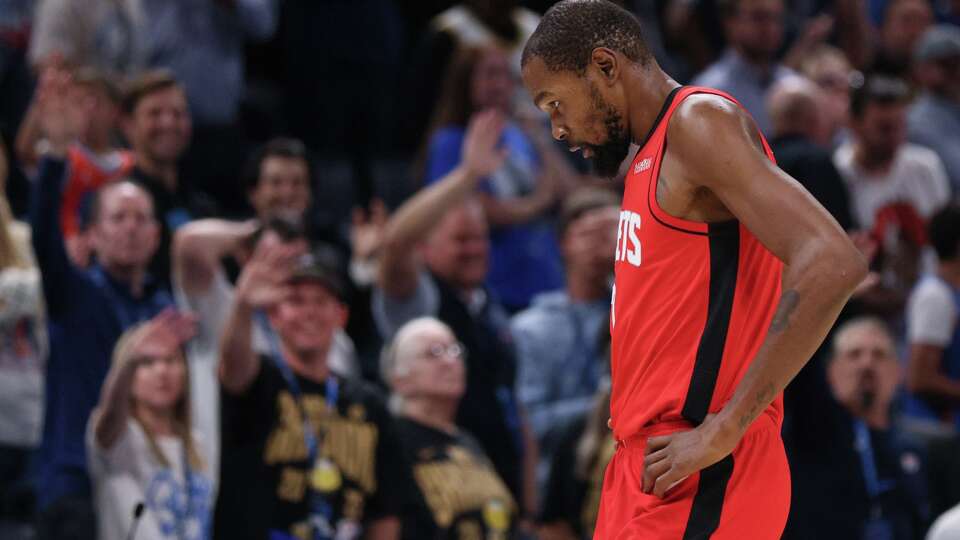 Houston Rockets forward Kevin Durant leaves the court after fouling out during the second overtime of an NBA basketball game against the Oklahoma City Thunder, Tuesday, Oct. 21, 2025, in Oklahoma City. (AP Photo/Nate Billings)