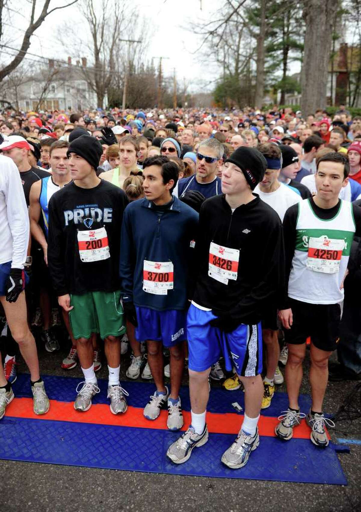 Runners line up to start before the 33rd Pequot Running Club Thanksgiving Day five-mile race in Southport on November 25, 2010.