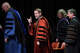 University of Texas President Jim Davis throws the horns while walking off stage at his investiture ceremony at Hogg Memorial Auditorium on Wednesday, Oct. 22, 2025.