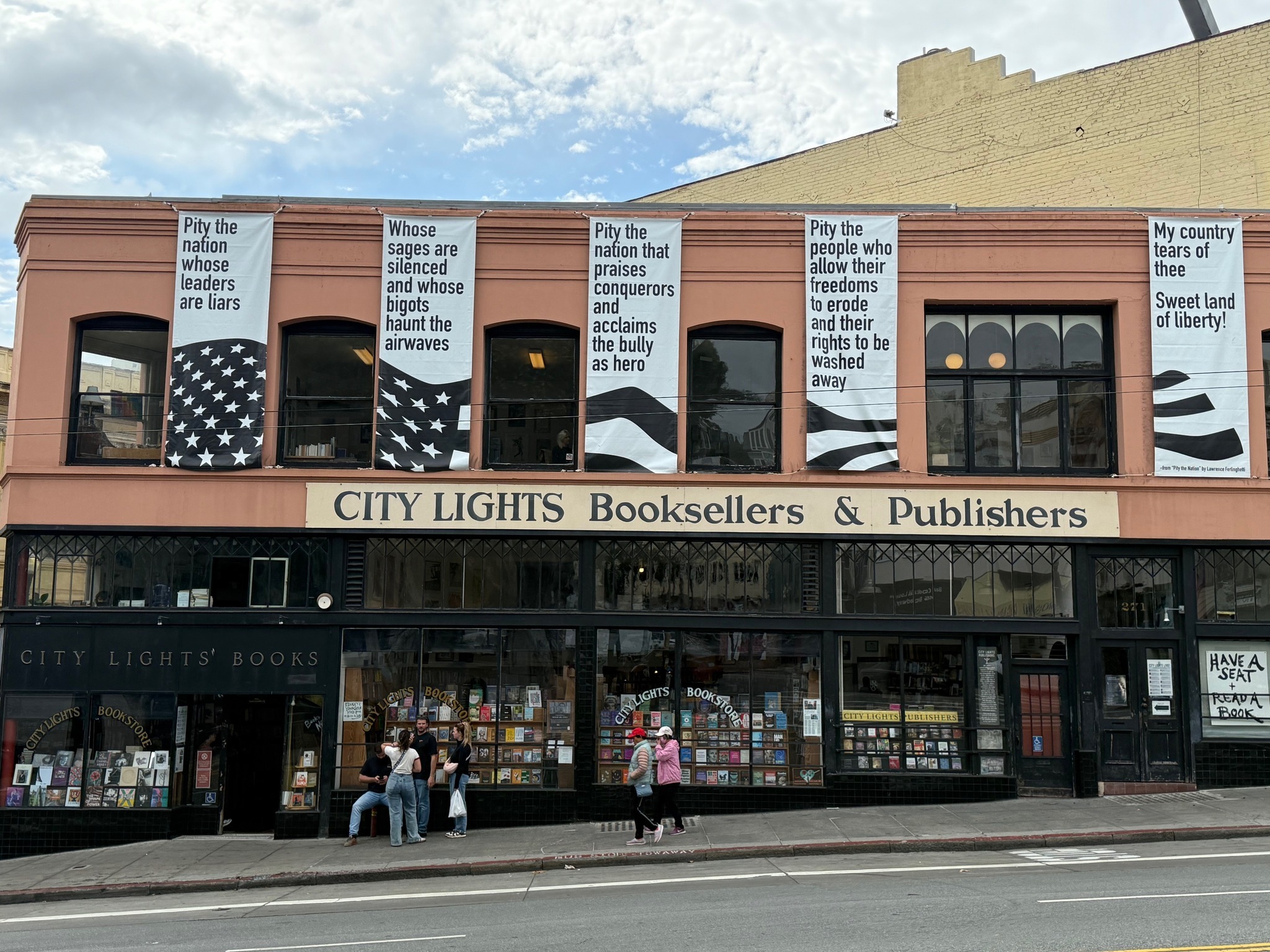 S.F.'s City Lights displays banners warning against tyranny