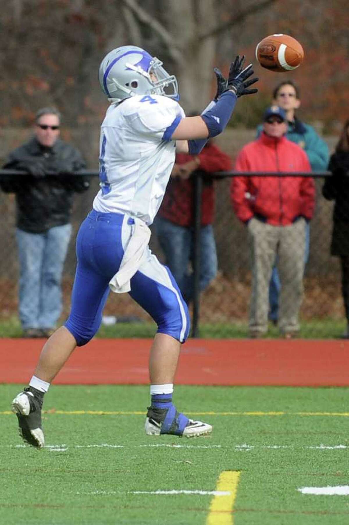 Ludlowe's Nicholas Fernandes catches an interception during Thursday's Thanksgiving Day game at Fairfield Warde High School on November 25, 2010.