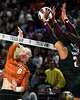Texas Longhorns outside hitter Abby Vander Wal (6) spikes the ball during the game against Texas A&M at Reed Arena on Friday, Oct. 31, 2025 in College Station, Texas.