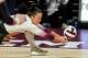 Texas A&M libero Ava Atwood (12) misses a serve return during the game against the Texas Longhorns at Reed Arena on Friday, Oct. 31, 2025 in College Station, Texas.