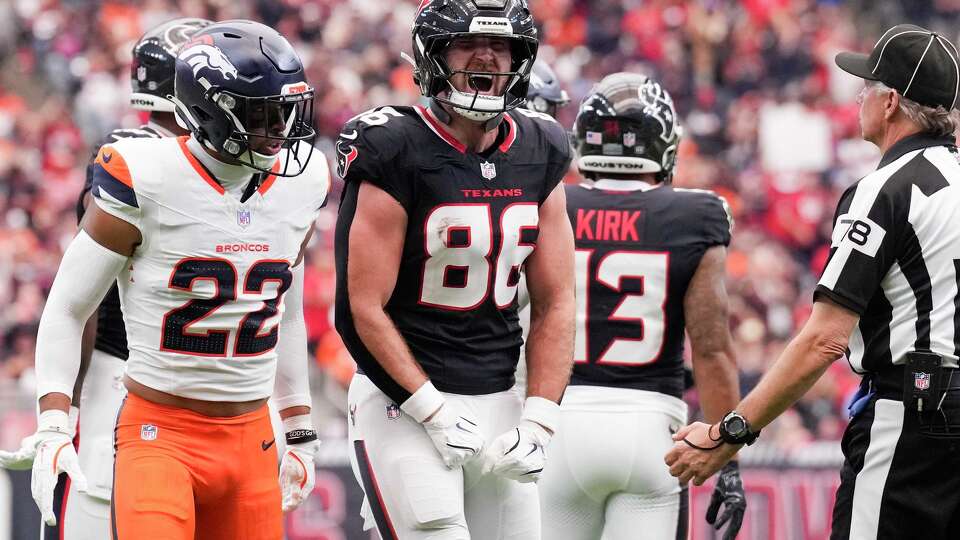 Houston Texans tight end Dalton Schultz (86) reacts after catching a 47-yard pass from quarterback C.J. Stroud during the first half of an NFL football game at NRG Stadium in Houston, Sunday, Nov. 2, 2025.