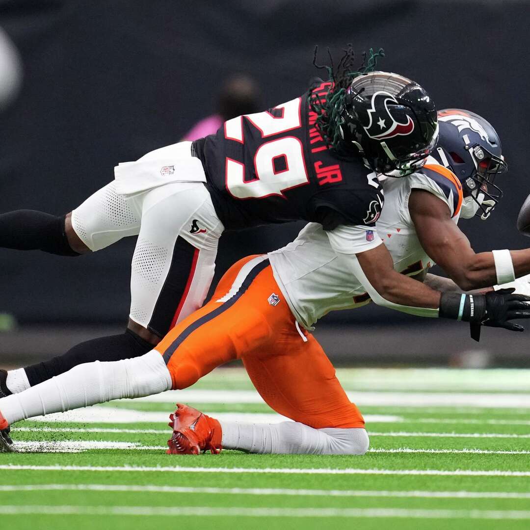 Houston Texans safety M.J. Stewart (29) breaks up a pass intended for Denver Broncos wide receiver Courtland Sutton (14) during the second half of an NFL football game at NRG Stadium in Houston, Sunday, Nov. 2, 2025.