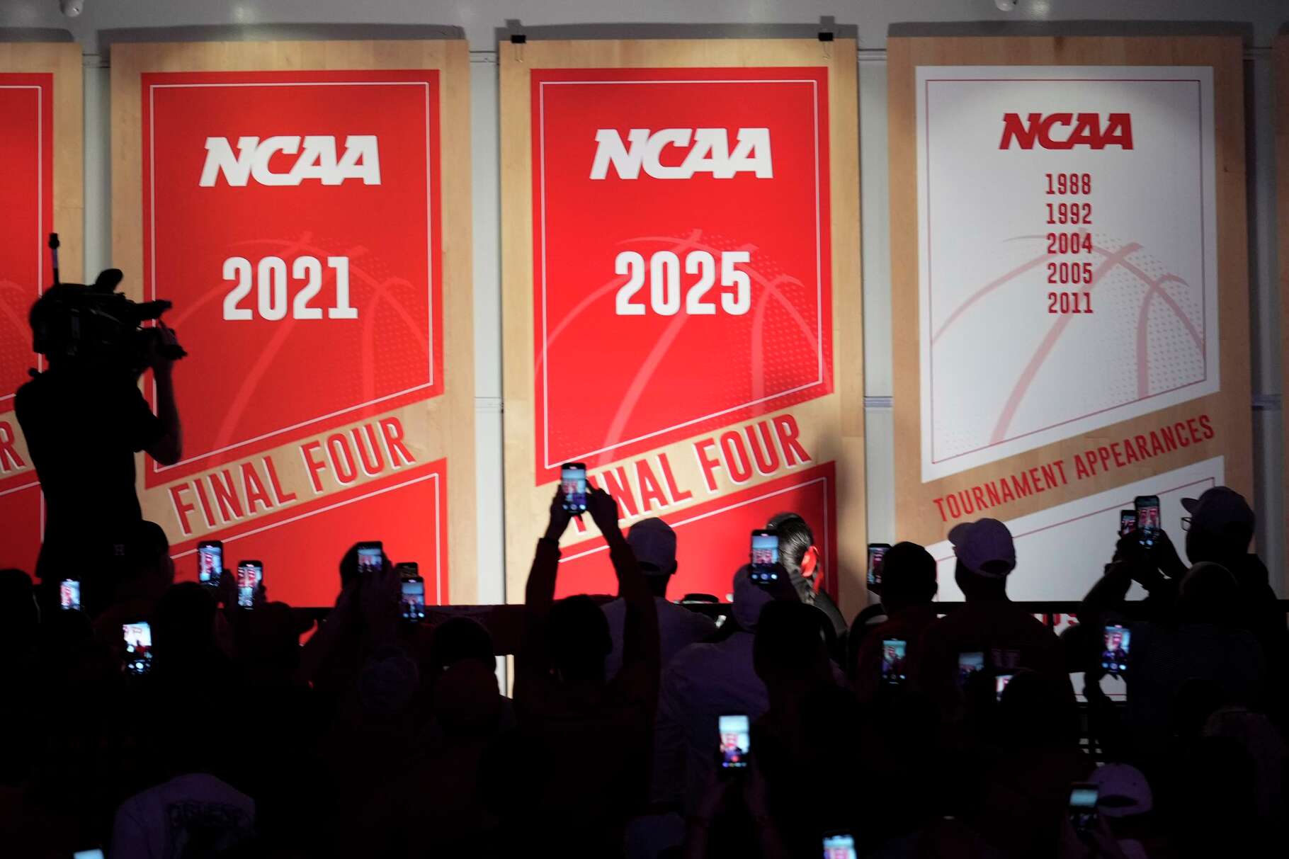 The Houston Cougars unveil their 2025 Final Four banner before an NCAA college basketball game against Lehigh at Fertitta Center in Houston, Monday, Nov. 3, 2025.