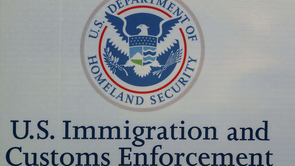 File: A U.S. Department Of Homeland Security and U.S. Immigration and Customs Enforcement logo is displayed on a sign in San Diego, California. 