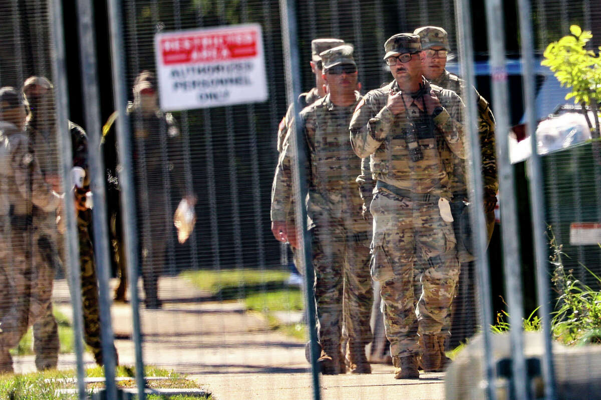 Texas National Guard members patrol outside of the U.S. Immigration and Customs Enforcement holding facility in Broadview, Illinois, on Oct. 9, 2025. (Stacey Wescott/Chicago Tribune/TNS)