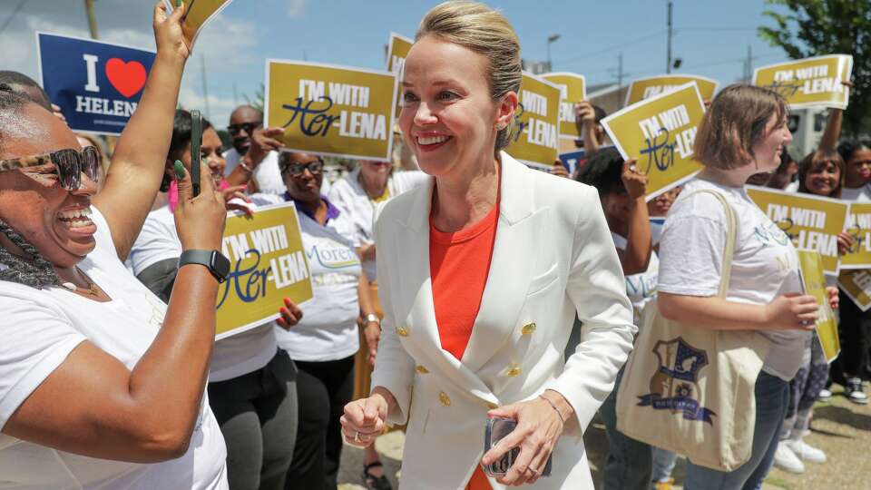 New Orleans City Councilmember Helena Moreno greets supporters as she arrives to submit her qualifying paperwork to run for mayor at the Orleans Parish Clerk of CourtÍs Office on Wednesday, July 9, 2025. (Brett Duke/The Times-Picayune/The New Orleans Advocate via AP)