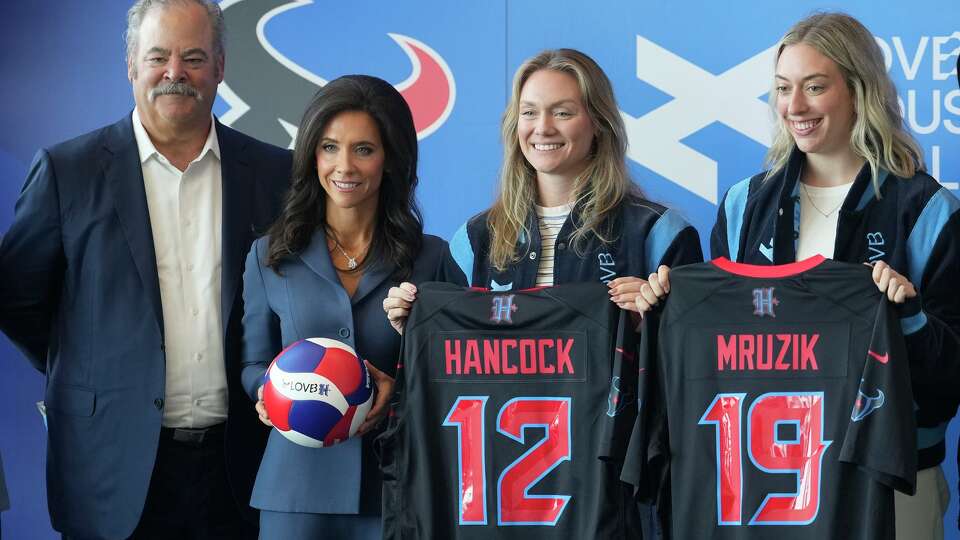 Cal McNair, left, Hannah McNair, Texans owners, with Micha Hancock, LOVB player, and Jess Mruzik, LOVB player, are shown during press conference about Texans acquiring the Houston franchise in the League One Volleyball league, LOVB, in Houston Thursday, Nov. 6, 2025.