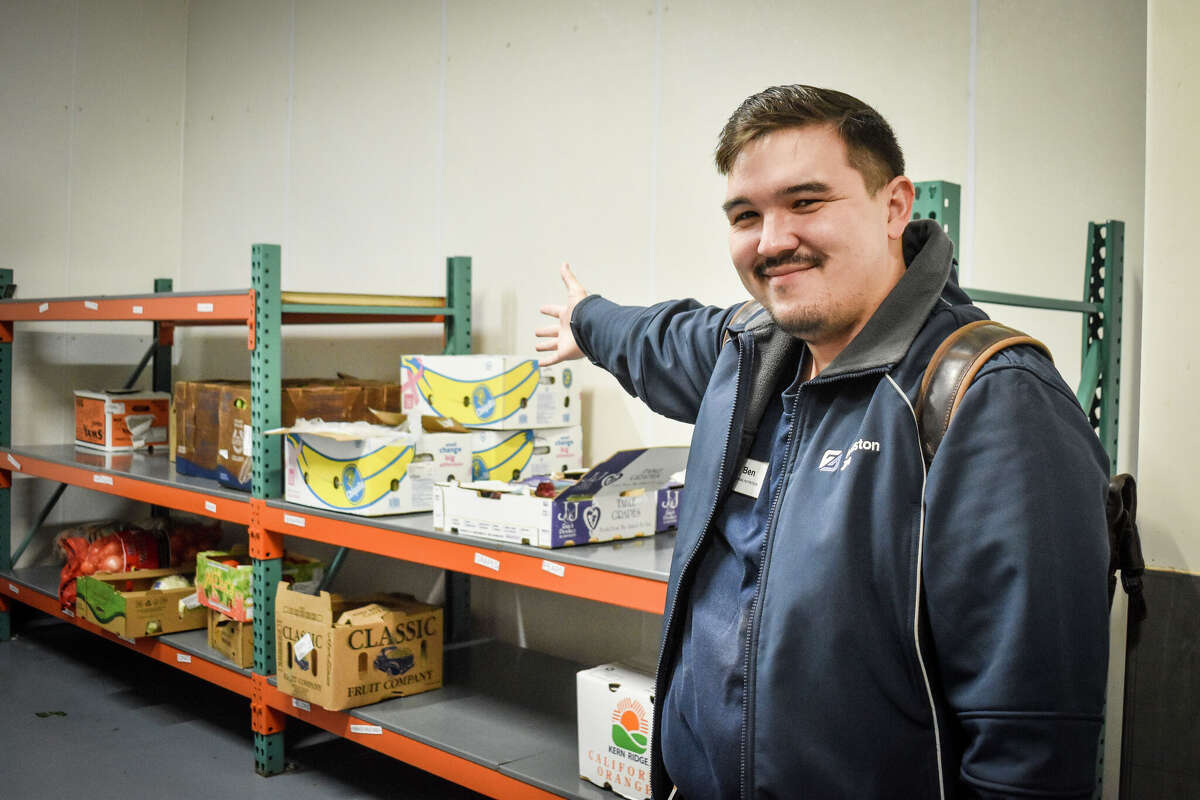 Benjamin Po, the Houston Zoo's first animal nutritionist, oversees meal prep for hundreds of animals each morning. 