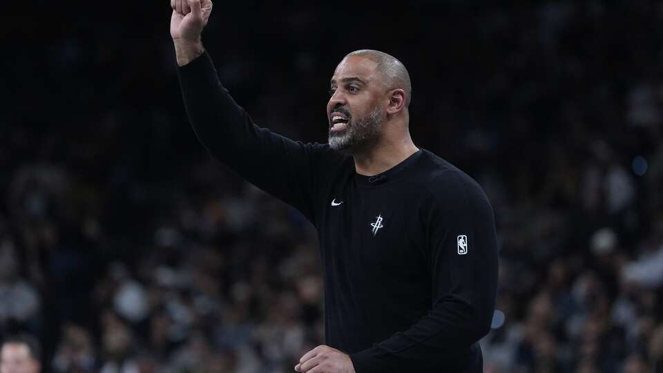 Houston Rockets head coach Ime Udoka signals to his players during the second half of an NBA Cup basketball game against the San Antonio Spurs in San Antonio, Friday, Nov. 7, 2025. (AP Photo/Eric Gay)