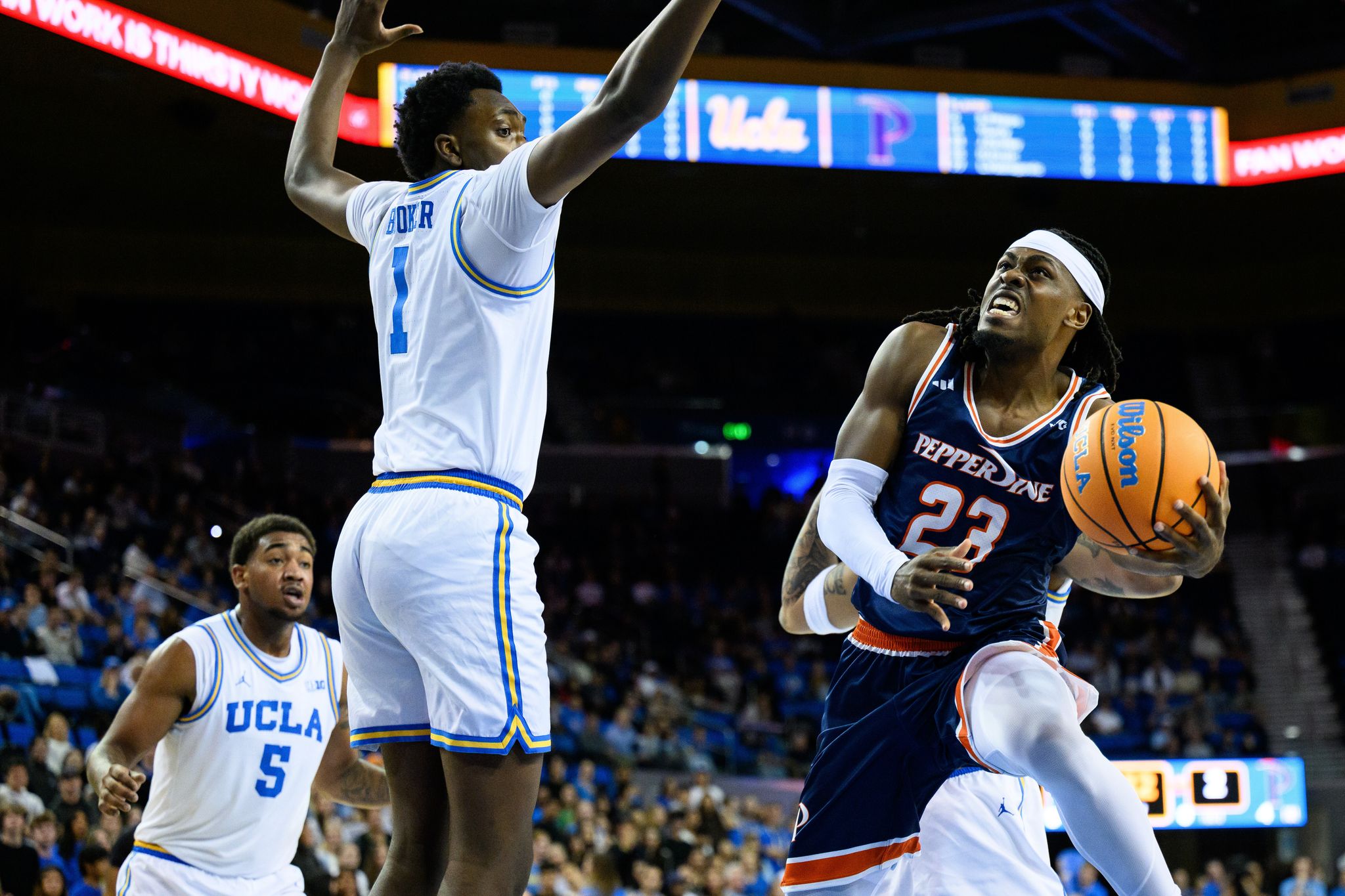 Xavier Booker leads No 12 UCLA to 74 63 victory over Pepperdine with