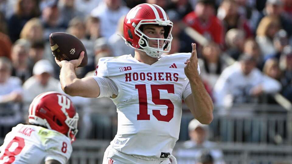 Indiana quarterback Fernando Mendoza (15) looks to pass against Penn State during the first half of an NCAA college football game, Saturday, Nov. 8, 2025, in State College, Pa.