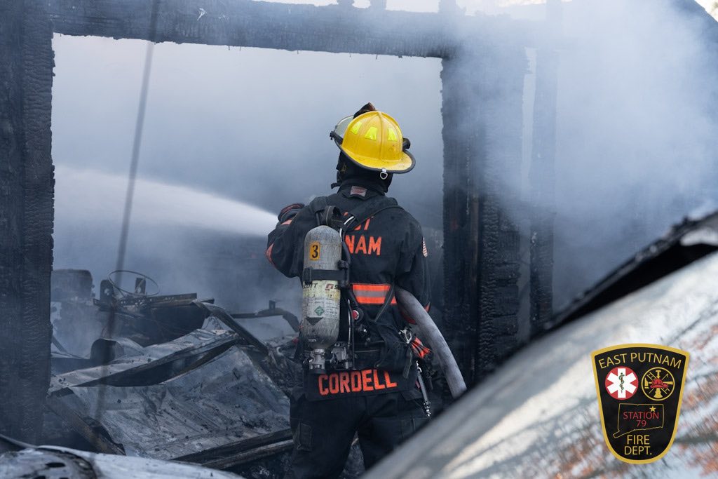 Thompson garage fire controlled in less than an hour, officials say