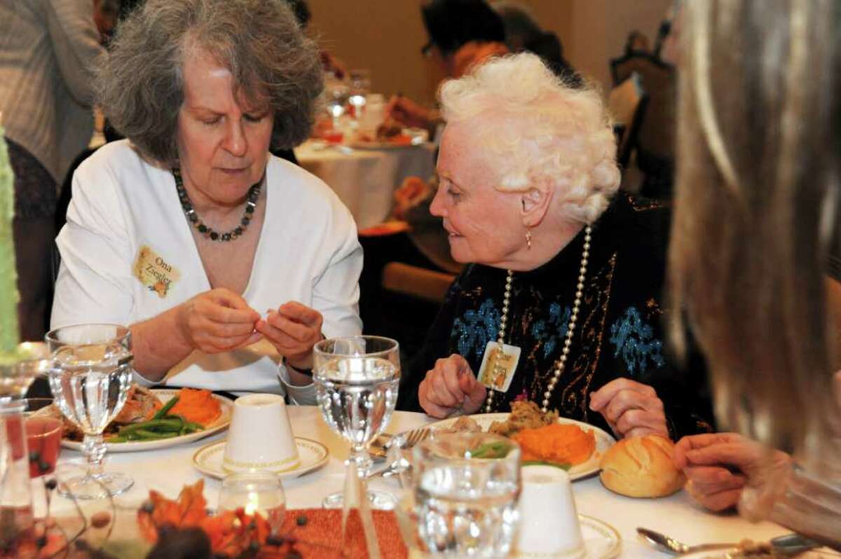 Ona Zigler, left, and Rose Jones enjoy the First Presbyterian Church of Greenwich's Thanksgiving dinner for Seniors on Thursday, Nov. 25, 2010.