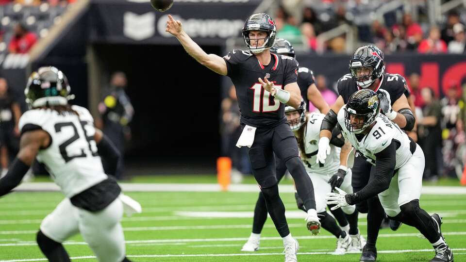 Houston Texans quarterback Davis Mills (10) throws a pass against the Jacksonville Jaguars during the first half of an NFL football game at NRG Stadium in Houston, Sunday, Nov. 9, 2025.
