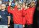 New recruits stand during the Oath of Enlistment delivered by President Donald Trump during an NFL football game between the Washington Commanders and the Detroit Lions at Northwest Stadium in Landover, Md., Sunday, Nov. 9, 2025.