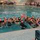Members of the Weston girls swimming and diving team celebrate at Cornerstone Aquatics in West Hartford after winning their 12th-straight CIAC Class S championship on Tuesday, Nov. 11, 2025.