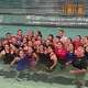 Members of the Wethersfield girls swimming and diving team celebrate after winning the CIAC Class M championship at Cornerstone Aquatics on Wednesday, Nov. 12, 2025.