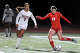 Siena Ettinger, right, of Greenwich takes a shot on goal in the CIAC Class LL semifinal against Ridgefield in Weston on November 12, 2025.