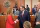 University of Texas President Jim Davis greets Rep. Shelby Slawson, R-Stephenville, before a meeting of the Select Committee on Civil Discourse and Freedom of Speech in Higher Education at the Capitol on Thursday, Nov. 13, 2025.