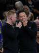 San Antonio Spurs associate coach Sean Sweeney talks to head coach Mitch Johnson during an NBA Cup game at Frost Bank Center in San Antonio, Friday, Nov. 14, 2025. The Spurs fell to the Warriors 109-108.