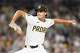 FILE - San Diego Padres relief pitcher Kyle Hart delivers during the eighth inning of a baseball game against the Colorado Rockies, Sept. 13, 2025, in San Diego.