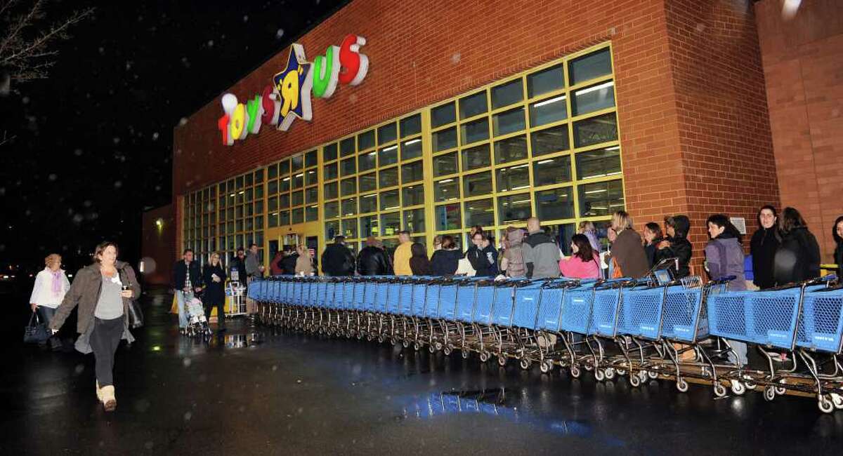 Custumers line up at Toys R Us in Danbury for the 10 p.m. opening of the store Thanksgiving night. Photo taken Thursday, Nov. 25, 2010.