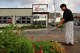 Koriente owner Won Lee tends to the garden at the East Seventh Street restaurant in 2005.