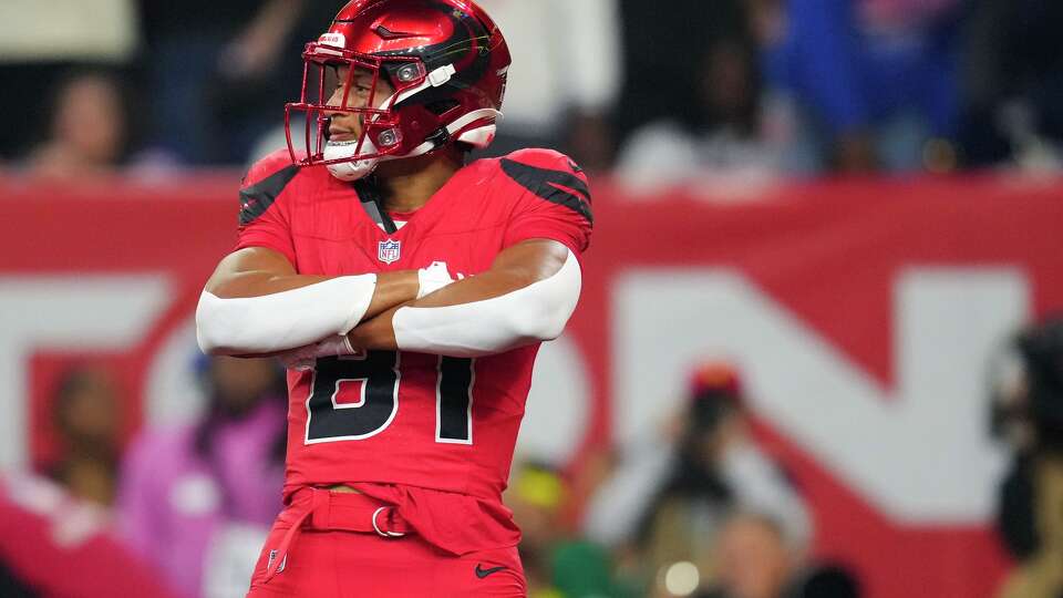 Houston Texans wide receiver Jayden Higgins (81) reacts after catching a 8-yard touchdown pass during the first half of an NFL football game in Houston, Thursday, Nov. 20, 2025.