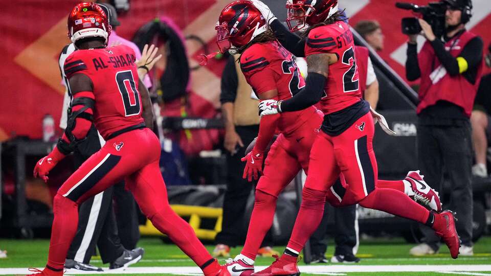 Houston Texans safety Jaylen Reed (23) runs up the field celebrating after picking up a Buffalo Bills fumble during the second half of an NFL football game in Houston, Thursday, Nov. 20, 2025.