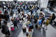 Travelers line up at the security checkpoint at O’Hare International Airport in Chicago on Nov. 22, 2024, ahead of Thanksgiving.