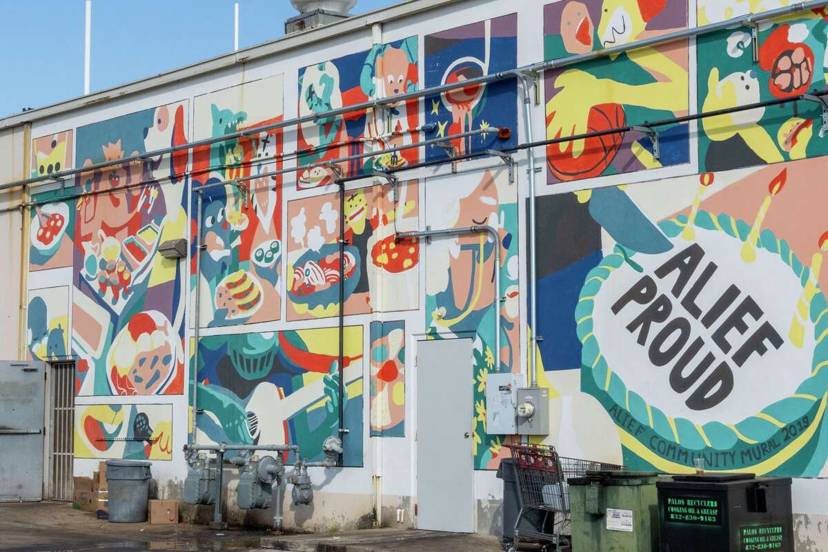 A mural is seen on an exterior wall of an Alief shopping center in Houston, Friday, Nov 21, 2025.